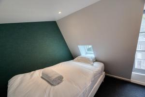 Appartements Jonathan Appartement avec place de parking : photos des chambres
