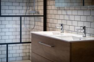 Appartements Jonathan Appartement avec place de parking : photos des chambres