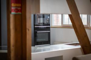 Appartements Jonathan Appartement avec place de parking : photos des chambres