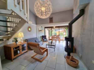Maisons de vacances La maison des glycines : photos des chambres