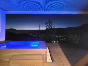 Appartements Logement avec jacuzzi et sauna en terrasse, belle vue panoramique : photos des chambres