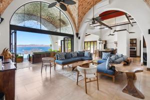 Dreamy Spanish-Style Villa with Sweeping Ocean Views, Elegant Nautical Design & Giant Infinity Pool