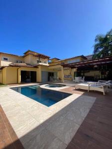 Casa em buzios c piscina e 4 suítes