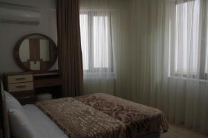 Two-Bedroom Apartment with Balcony room in Almasa Suite Aparts