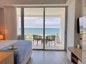 Suite moderna con vista al mar y parque CB 814