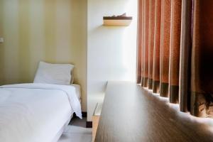 Comfy 1BR Apartment Scientia Residences By Travelio