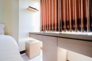 Comfy 1BR Apartment Scientia Residences By Travelio