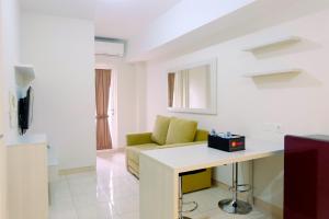 Clean 2BR Apartment at 12th Floor Springlake Summarecon Bekasi By Travelio