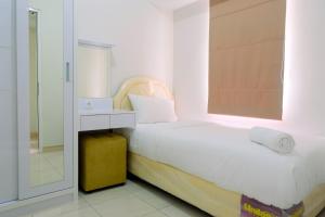 Clean 2BR Apartment at 12th Floor Springlake Summarecon Bekasi By Travelio