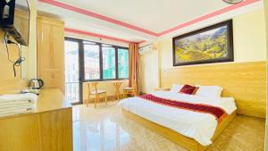 Phòng 4 Người Có Ban Công (Quadruple Room with Balcony)