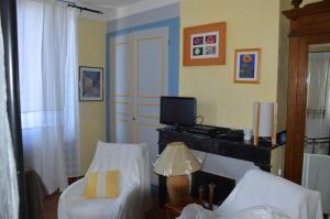 Appartements Volets Bleus et Briques Rouges : photos des chambres