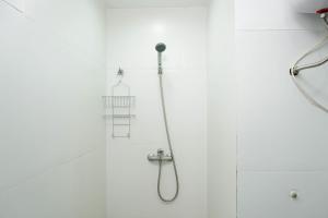 Spacious 3BR Ambassade Kuningan Apartment By Travelio