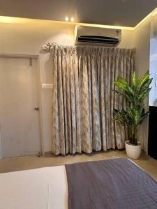 Terra Private Studio with Balcony WiFi Ac Smart TV Kitchenette Washing Machine