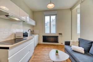 Appartements L'Oiseau Blanc un petit nid proche de la gare ! : photos des chambres