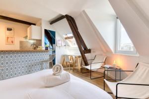 Appartements Elisabeth Confortable studio avec lit double en centre ville : photos des chambres