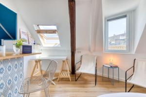 Appartements Elisabeth Confortable studio avec lit double en centre ville : photos des chambres