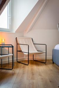 Appartements Elisabeth Confortable studio avec lit double en centre ville : photos des chambres