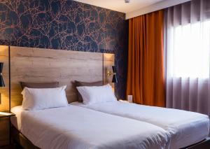 Hotels Brit Hotel Ker Lann Aeroport - Parc Expo : photos des chambres