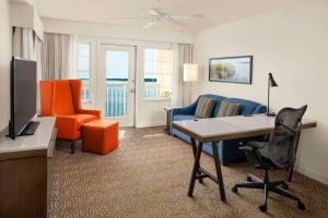 Junior King Suite with Sofa Bed and Balcony - Bayfront room in Hilton Garden Inn Kent Island