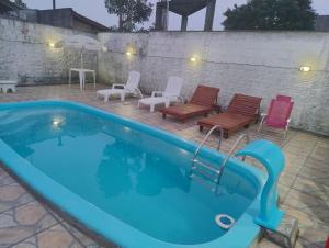 Casa de praia com piscina proximo a praia do Sonho e Pinheira - SC