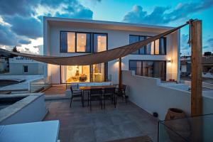 Theasis Beachfront Villa - Terrace by Hospi Living