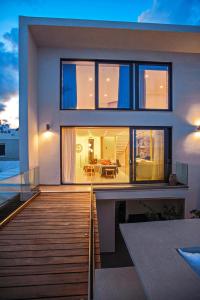 Theasis Beachfront Villa - Terrace by Hospi Living