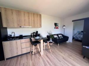 Appartements Natiboxe Studio : photos des chambres