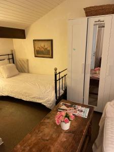 Sejours chez l'habitant L-arbre aux papillons : photos des chambres
