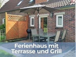 Ferienhaus Oll Smee 9 Huus EEN mit Terrasse, Grill und kleinem Garten