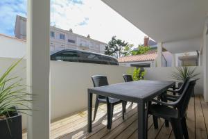 Appartement neuf, 150m de la grande plage, parking, proche commerces