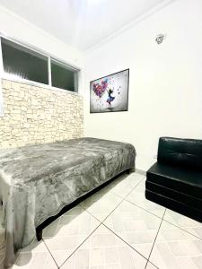 Linda Kitinete frente a praia