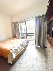 Apartamento 1013 com varanda e vista ao mar