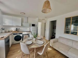 Appartements L-ileau, acces direct plage et jardin : photos des chambres