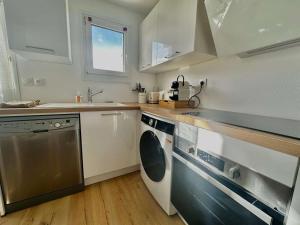 Appartements L-ileau, acces direct plage et jardin : photos des chambres