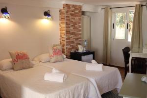 Twin Room room in Hotel Casa Día y Noche