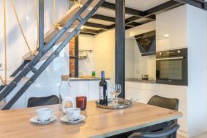 Apartament z antresolą Nowa Papiernia