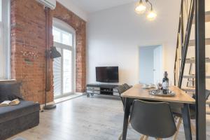 Apartament z antresolą Nowa Papiernia