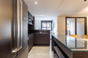 JPR - apartamentos a 260 metros da praia em Jurerê