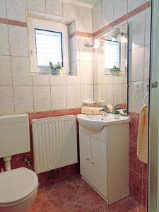 Apartments and rooms with a swimming pool Senj - 23592