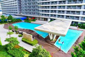 1BR Condotel with Balcony at FAME Residences #FM58