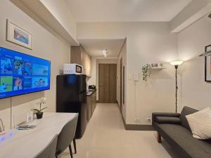 1BR Condotel with Balcony at FAME Residences #FM58