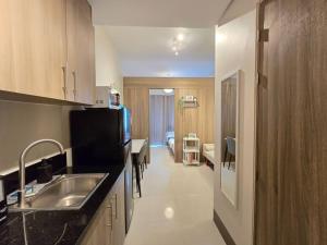 1BR Condotel with Balcony at FAME Residences #FM59