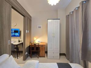 1BR Condotel with Balcony at FAME Residences #FM60