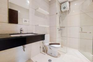 Nice and Homey 1BR at Brooklyn Alam Sutera Apartment By Travelio