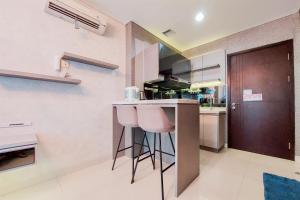 Nice and Homey 1BR at Brooklyn Alam Sutera Apartment By Travelio