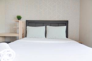 Nice and Elegant Studio at 9th Floor Ciputra International Apartment By Travelio