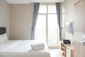 Nice and Elegant Studio at 9th Floor Ciputra International Apartment By Travelio