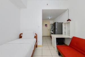 Cozy Stay Studio Apartment at M-Town Residence By Travelio