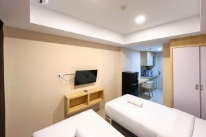 Minimalist Studio at De Prima Apartment Medan By Travelio