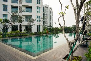 Best Deal and Comfort 1BR at Citralake Suites Apartment By Travelio